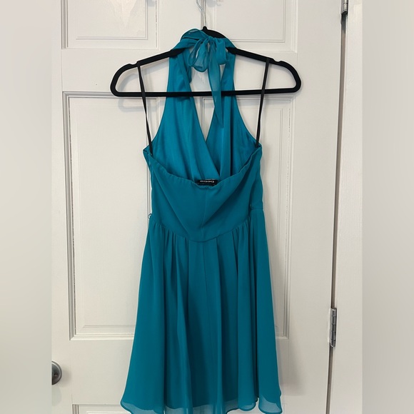 Teal/ Aqua bebe above the knees halter dress. Size small. Like new. - Picture 2 of 2